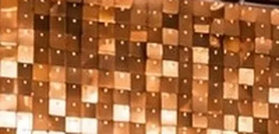 Champagnekleurige paillettenwand